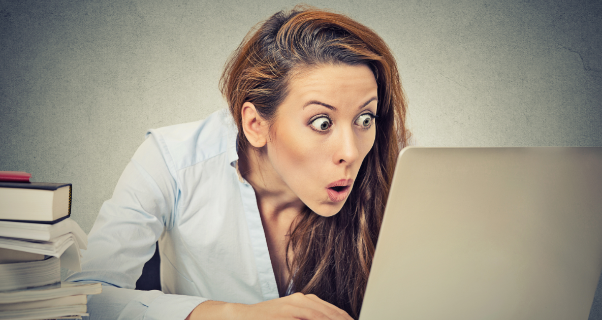 woman shocked reading business blog