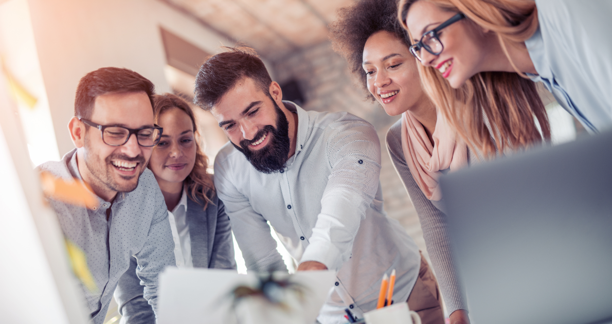 a team creating their business content at a table